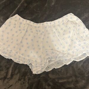 Fashion Nova White and Blue Patterned Shorts